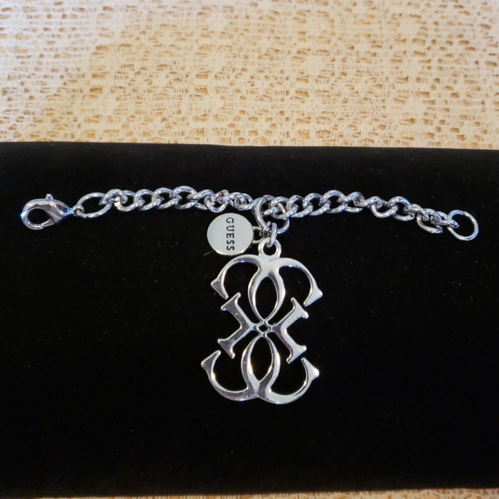 Small Guess silver charm bracelet